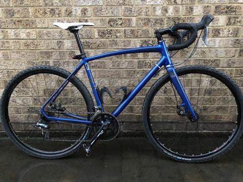 Raleigh mustang gravel bike with extra wheelset