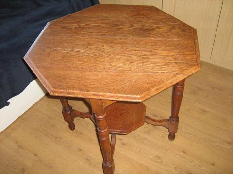 Solid oak octagonal table. 28