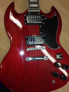 Gibson SG style electric guitar and genuine Gibson gigbag