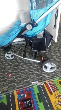 A lovely blue stroller cancelled rain cover from a smoke free room