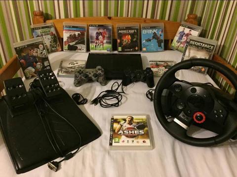 BUNDLE PS3 SUPERSLIM 500GB + LOGITECH DRIVING FORCE GT + 2 CONTROLLERS + 11 GAMES