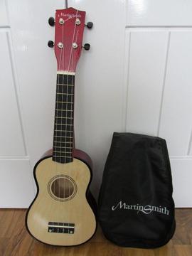 Ukulele with cover, strung for left handed use