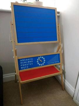 Children's easel -blackboard and a magnetic side