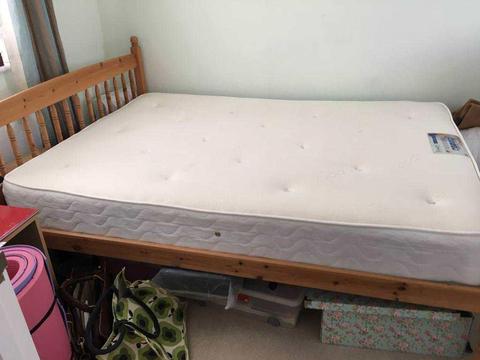 Wooden double bed frame and mattress