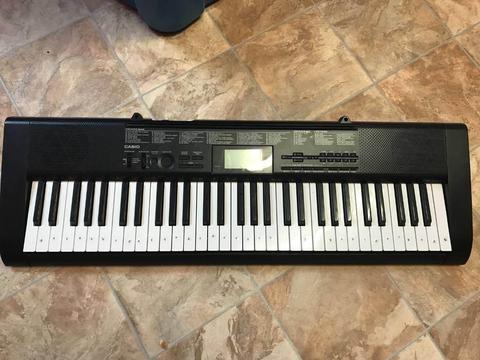 Casio ctk1150 keyboard with stand and headphones
