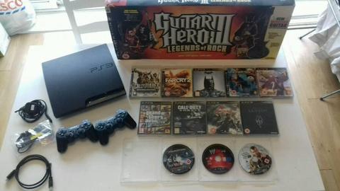 Playstation 3 console. 2 controllers 14 great games & wireless guitar hero