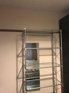 Glass and metal shelving unit