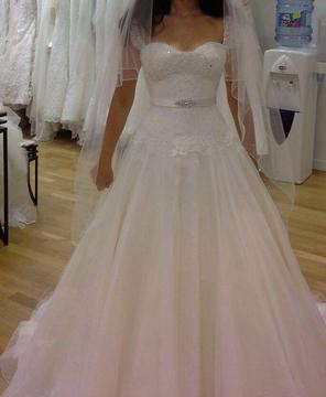 Beautiful designer Ivory wedding dress , size 6