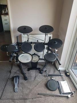 Roland TD6 electronic drum kit. With extra cymbals, pads and mesh head kick drum and snare