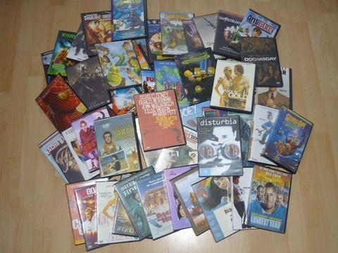 OVER 100 (NON ORIGINAL) DVDs. PHOTO ONLY SHOWS ABOUT HALF OF THEM. MOST GENRES COVERED,