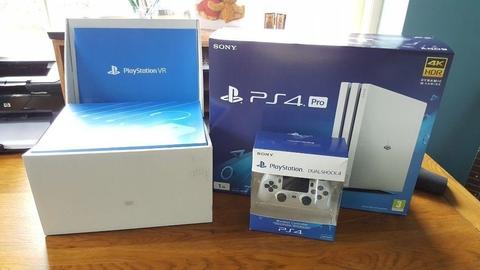 PS4 Pro White 1 TB With Vr headset and 3 games 2 controllers. Unwanted Xmas pres, boxed as new, £500