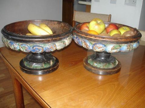 A pair of vintage wooden bowls