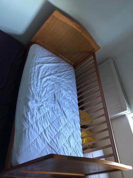 Baby cot with mattress. In a very good condition