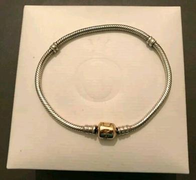 Genuine Pandora moments bracelet with gold clasp