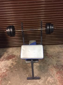 Weight training bench with vinyl weights