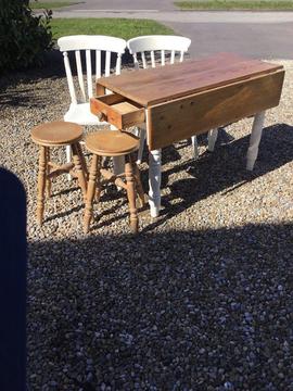 Pine kitchen drop leaf table, two chairs, two stools