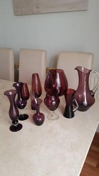 Various dark purple glass vases/jugs