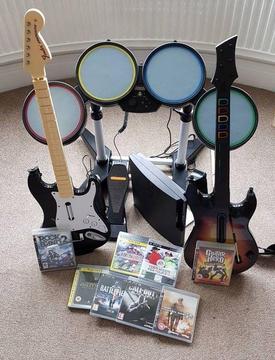 320GB PS3 + rock band drum kit + 2 guitars and 8 games!!!!