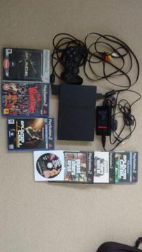 Play station 2 mini console and games
