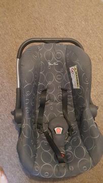 FREE CAR SEAT AND BLACK TV TABLE