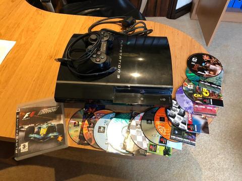 PlayStation 3 with 13 games and controller