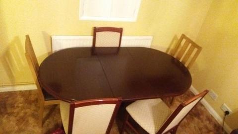 Extendable dining room table and chairs for sale