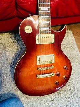 Vintage v100 gibson les paul style electric guitar