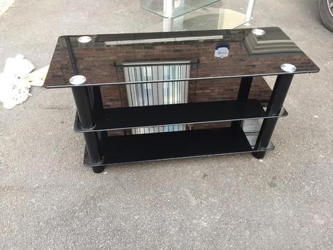 Two black glass tv stands