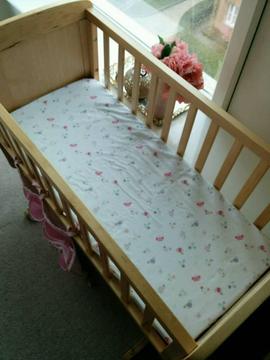 Rocking crib with mattress( used once or twice )
