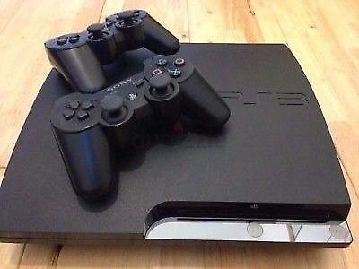 Ps3 slimline 320 gig hdd and 2 controllers + 20 games