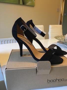 Black strappy shoes brand new in box