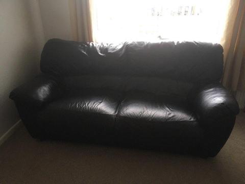 Black faux leather sofa
