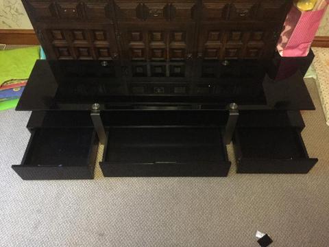 Gloss black, steel and glass tv stand