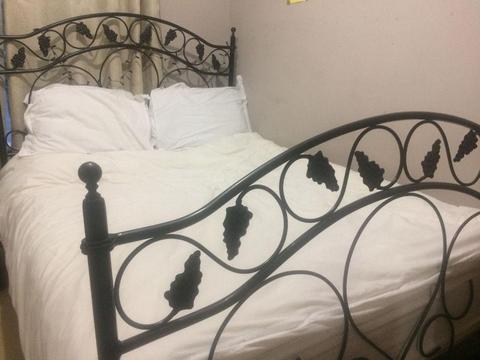 Decorative Wrought Iron Double Bed - Good condition with free (used) mattress