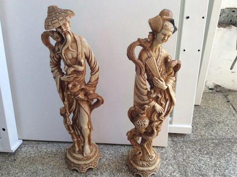 Oriental style statues