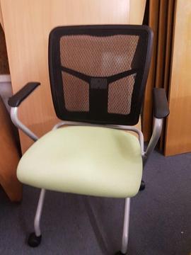Office chair with Mesh back and flip top seat never been used