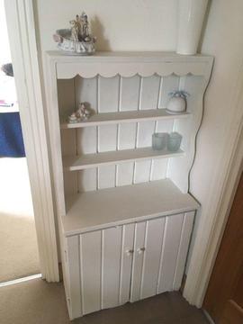Small wooden dresser with storage and shelving