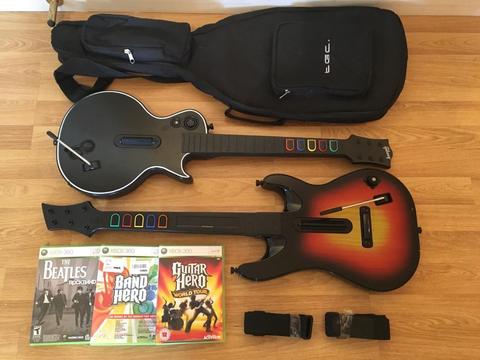 2 Guitar Hero Guitars With 3 games, Case and 2 Straps £20 no offers
