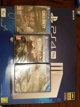 Brand new ps4 pro with 3 brand new games