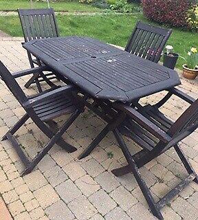Wooden patio furniture (table, 4 chairs)