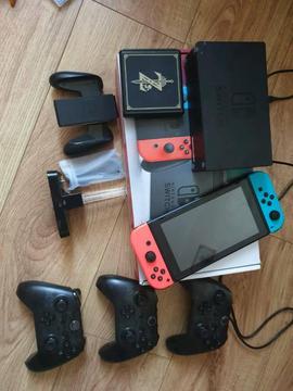 Nintendo switch 4 games and extras