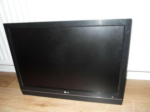 WALL MOUNTED FLAT SCREEN LG TV - 24 INCHES
