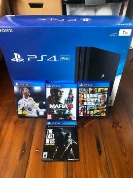 Boxed PS4 pro with games