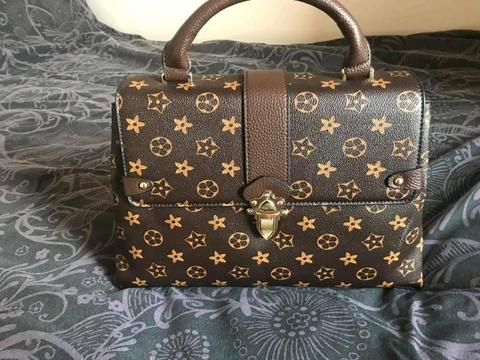 Brand new faux vouis vuitton bag with strap